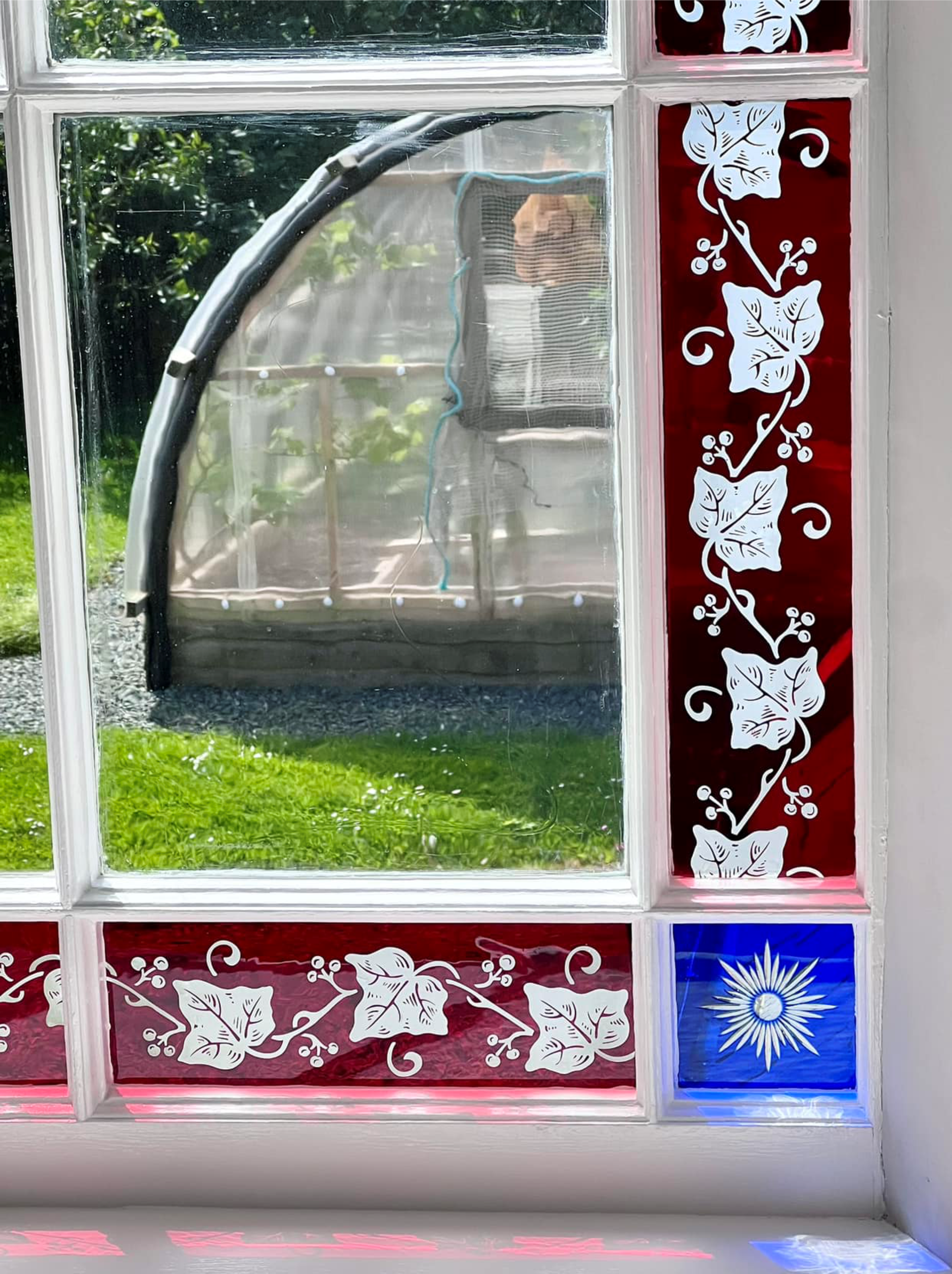 etched red flashed glass window